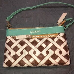 Spartina wristlet in Aqua Brown and white. Super cute has never been used.‎